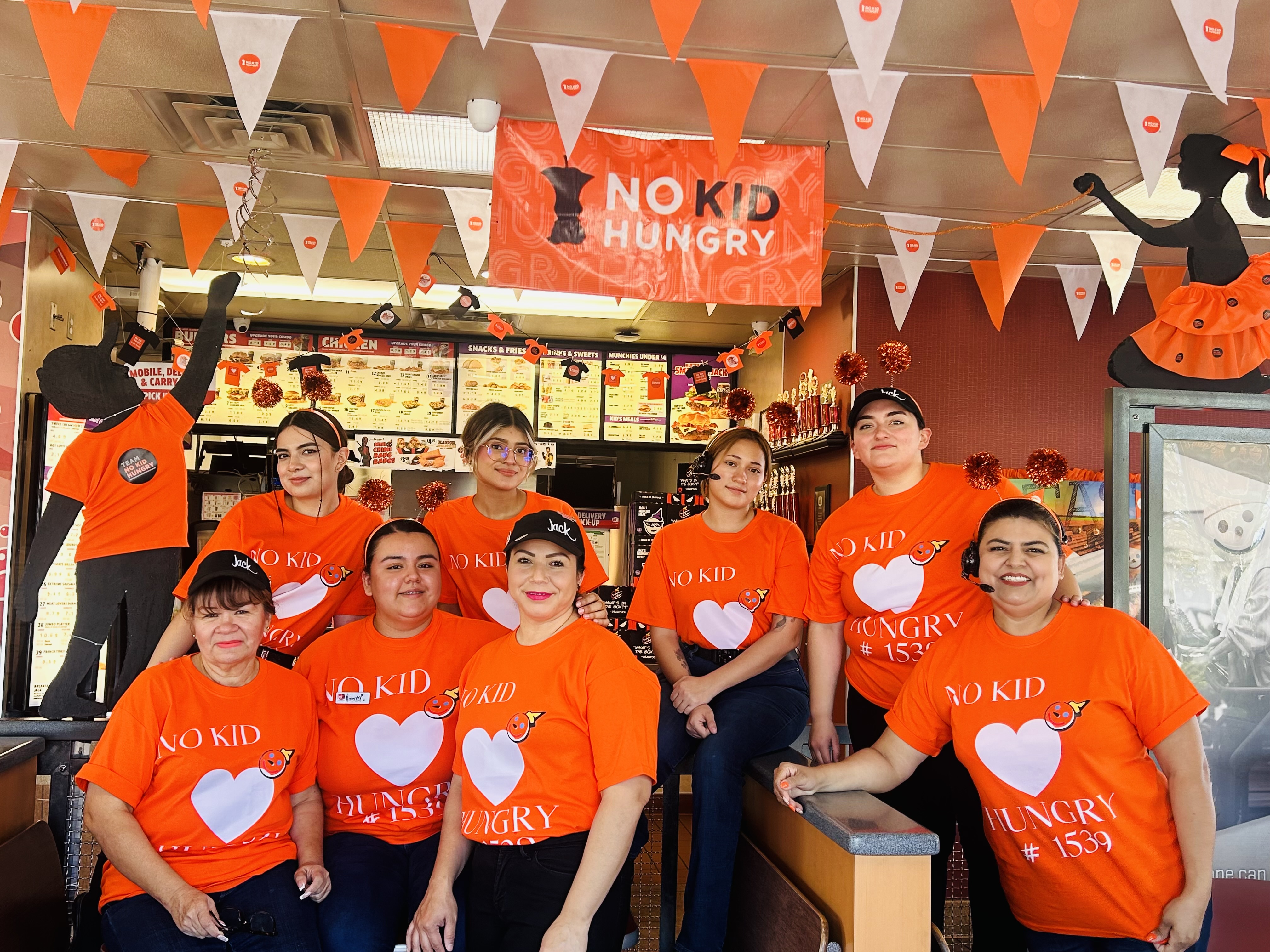 Team members supporting No Kid Hungry