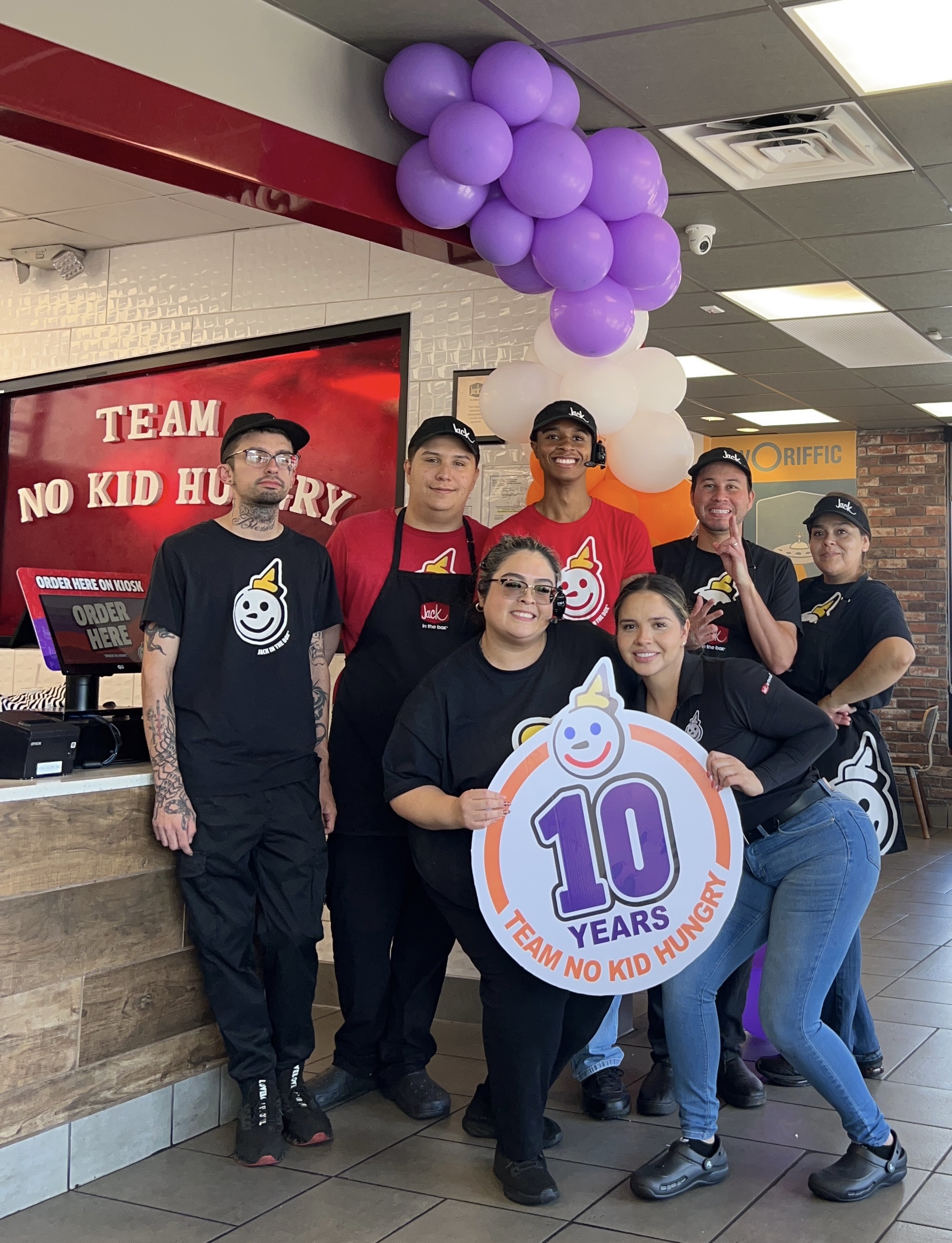 Team members supporting No Kid Hungry